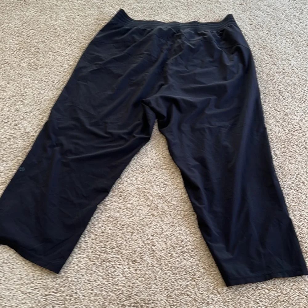 Lululemon Athletica SZ 12, black cropped wide leg pants .